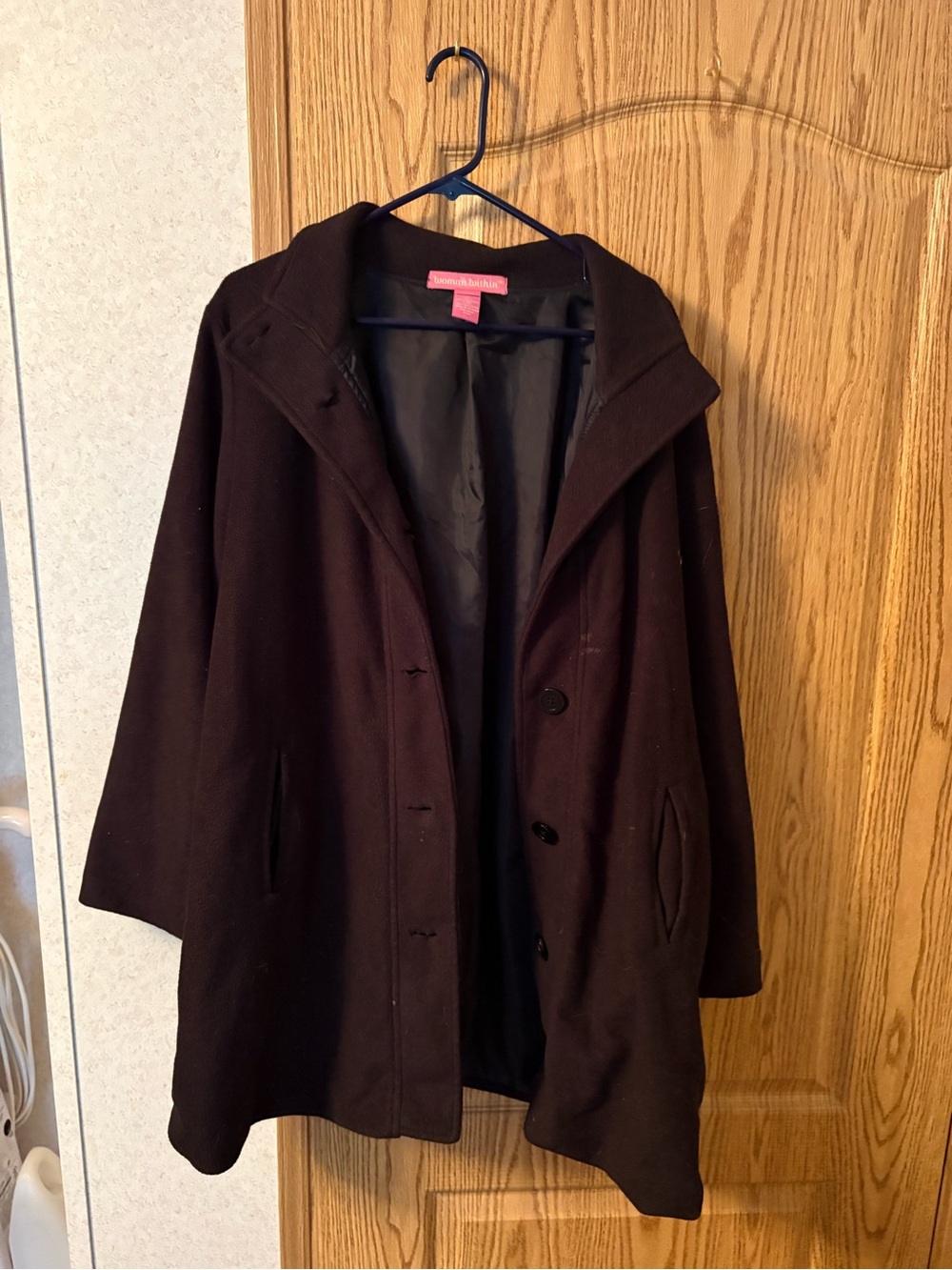 Woman Within Black Hooded Pea Coat